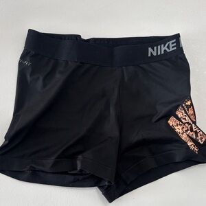 Nike pro Shorts  

Women's Black and Orange Athletic Shorts